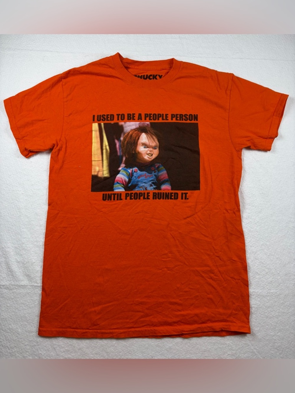 Child’s Play (Chucky) - “I Used To Be‎ A People Person… “ - Orange - M